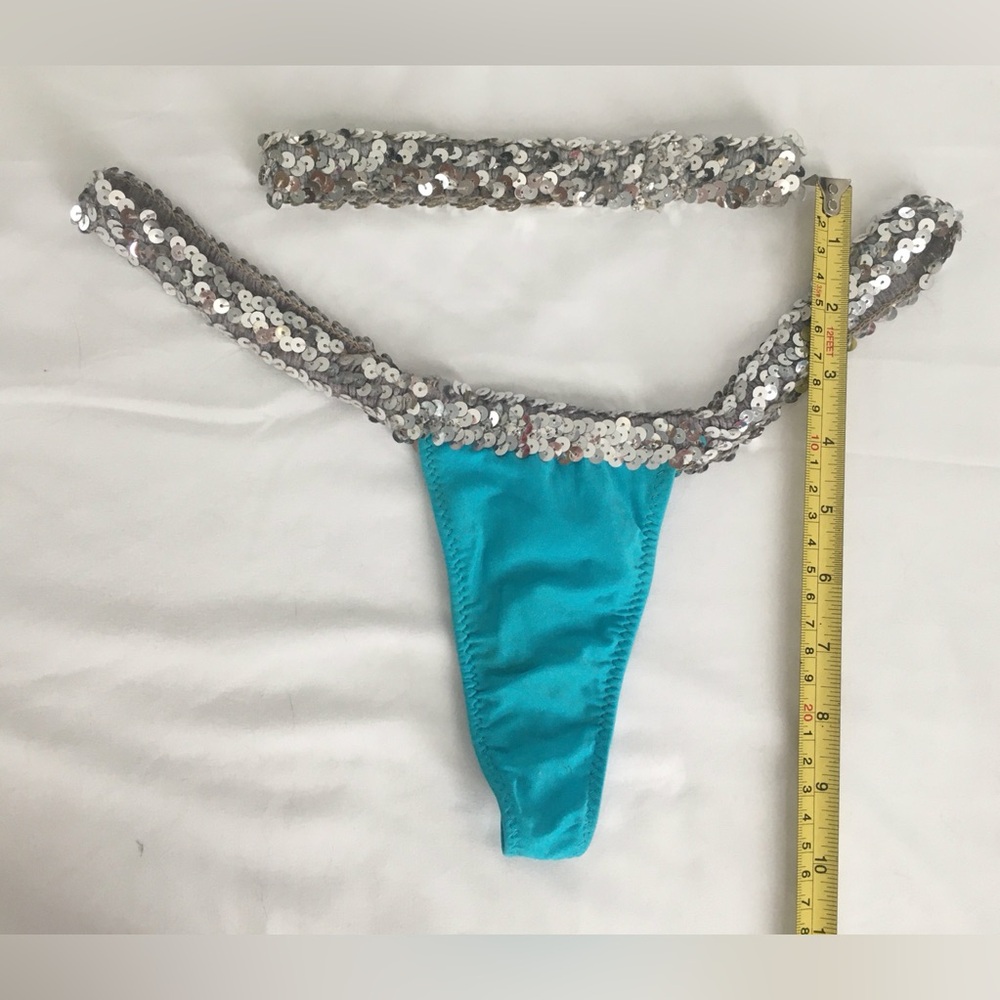 Silver sequins and teal thong and garter set, fits like L imo, stretchy.